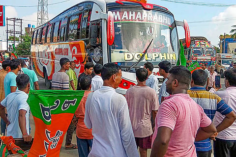 BJP's Bengal Bandh: BJP workers stop a bus on National Highway 12 during the party's 12-hour general strike in Malda